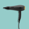 A black professional hairdryer with a gold accent, displayed against a teal background.