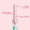 Pink hair straightener with text highlighting features on a pink background