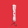 A red curling wand handle with a cherry print design, featuring a long cable and an on/off switch.