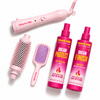 A pink hair styling set from Mark Hill including a handle, a round brush attachment, a paddle brush, and two bottles of Dream Protect hair protection spray and Dream Finish styling spray.