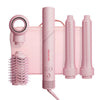 Pink appliances on white background