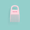 A pink curl comb with wide teeth, designed for brushes and combs, with the brand name 'Mark Hill' on the top.